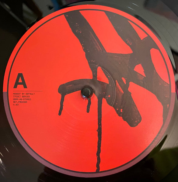 Modest By Default - The Curse Of Colonialism Vol.III | Near Mint (NM) Near Mint (NM)-Music History