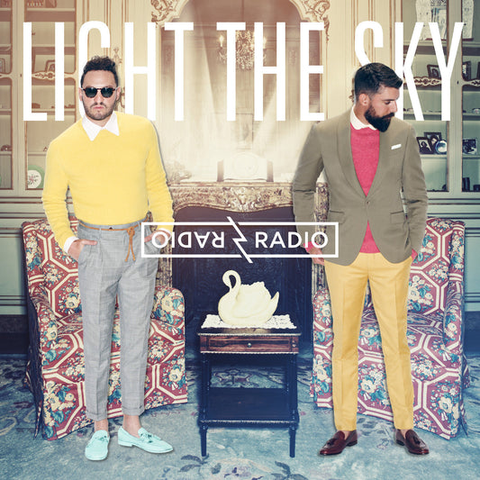 Radio Radio - Light the Sky (CD) |-Music History