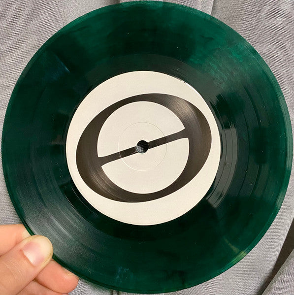 Wake Of Humanity - At Capacity (TRANSPARENT GREEN MARBLE VINYL 7") | Mint (M) Mint (M)-Music History