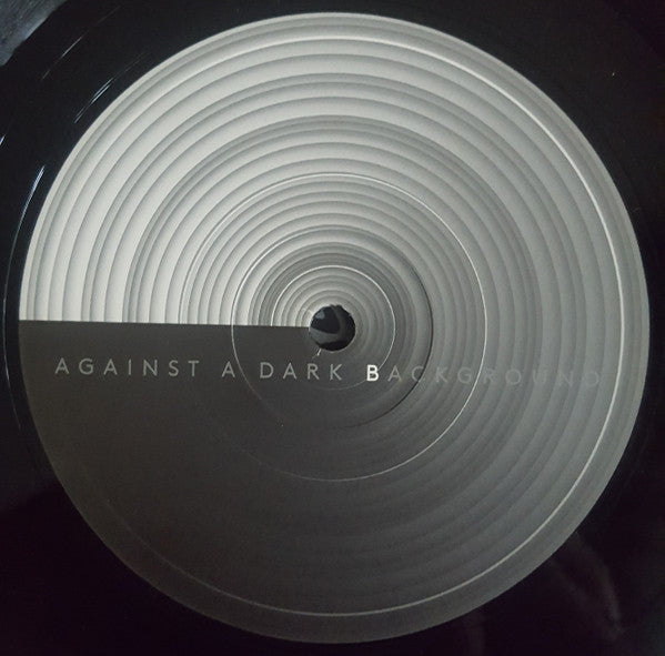 Against A Dark Background | Mint (M) Mint (M)--Music History